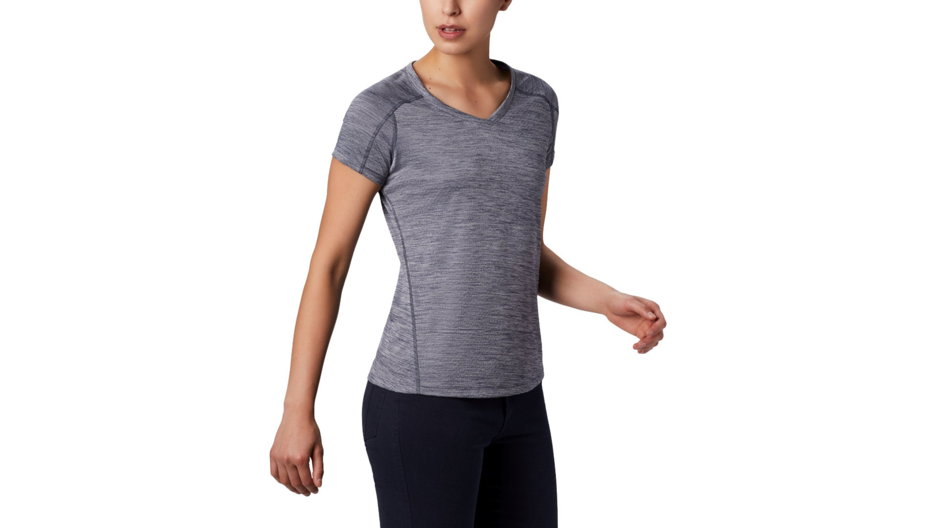 A woman wearing a grey running top